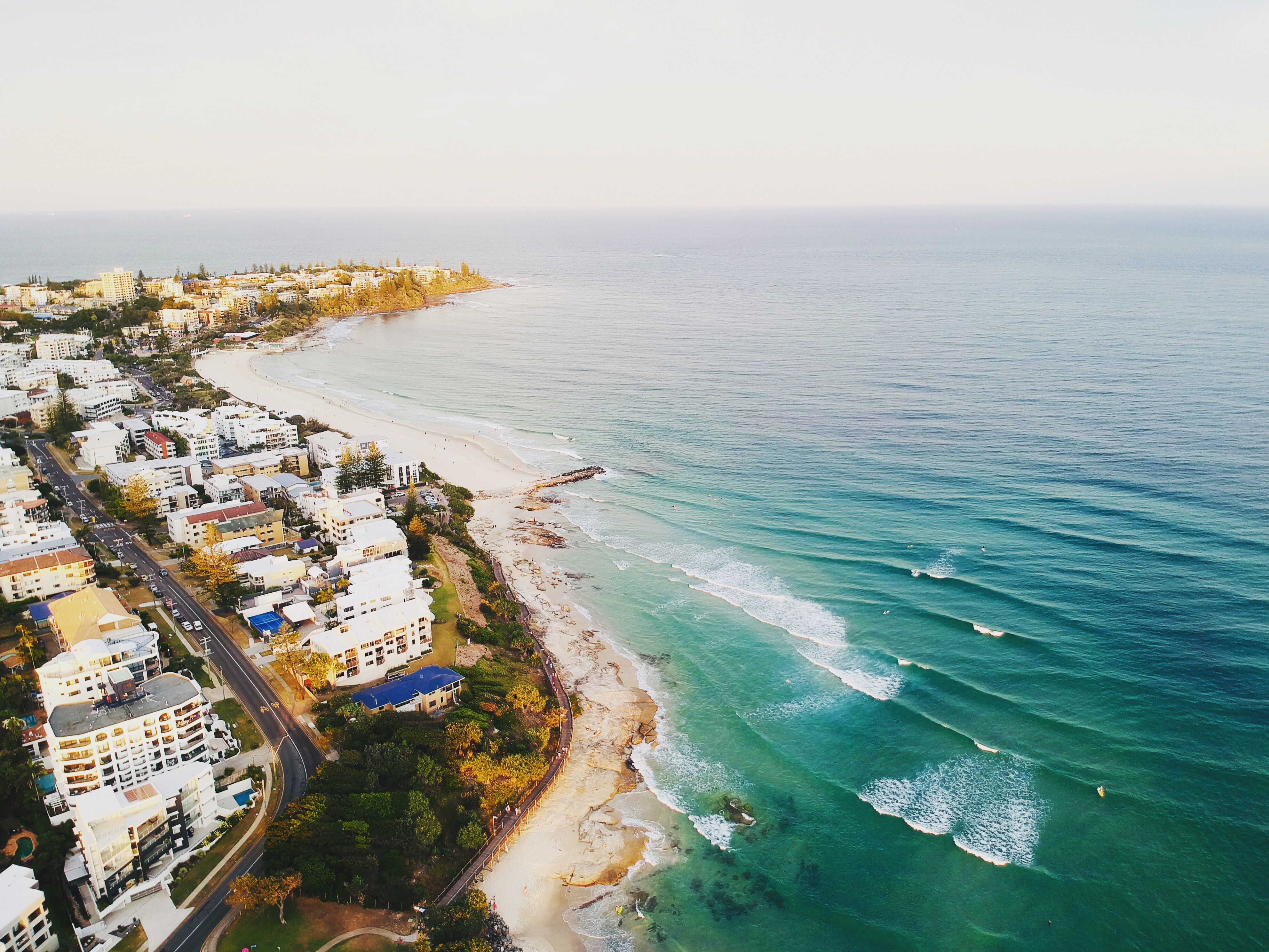 Aerial view of the coastline and beachfront homes in the area Ferrari's Pressure Washing services