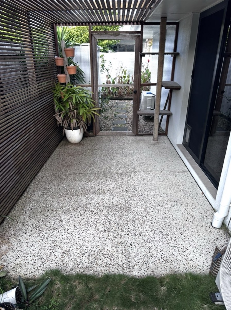 The same patio floor clean and even after pressure washing