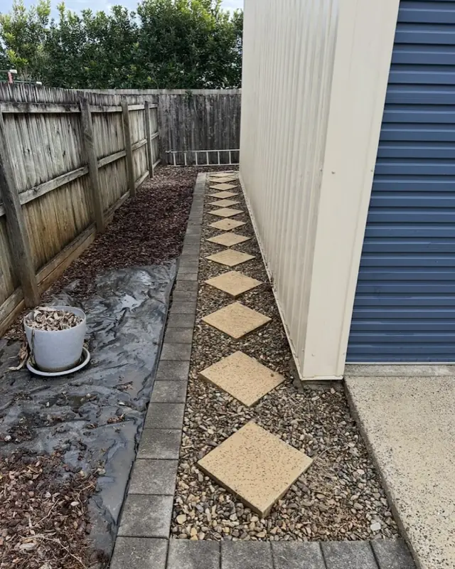 A stepping-stone garden path clean and light after pressure washing